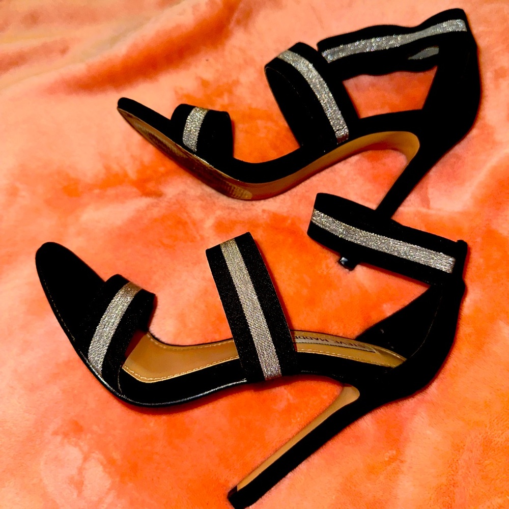 Steven Madden black with silver 4 inch heel.